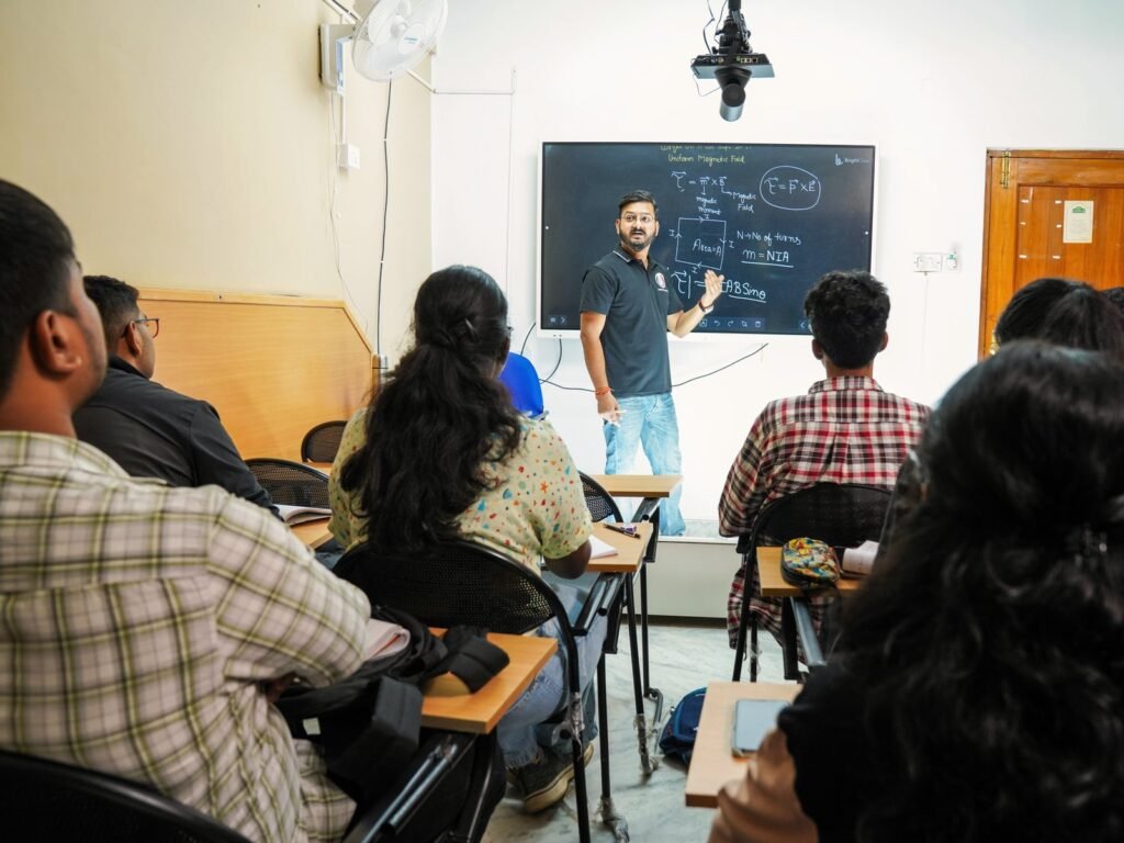 A class in progress at the Chakravyuh Science Academy Whitefield–Kadugodi branch, with faculty teaching at the display screen